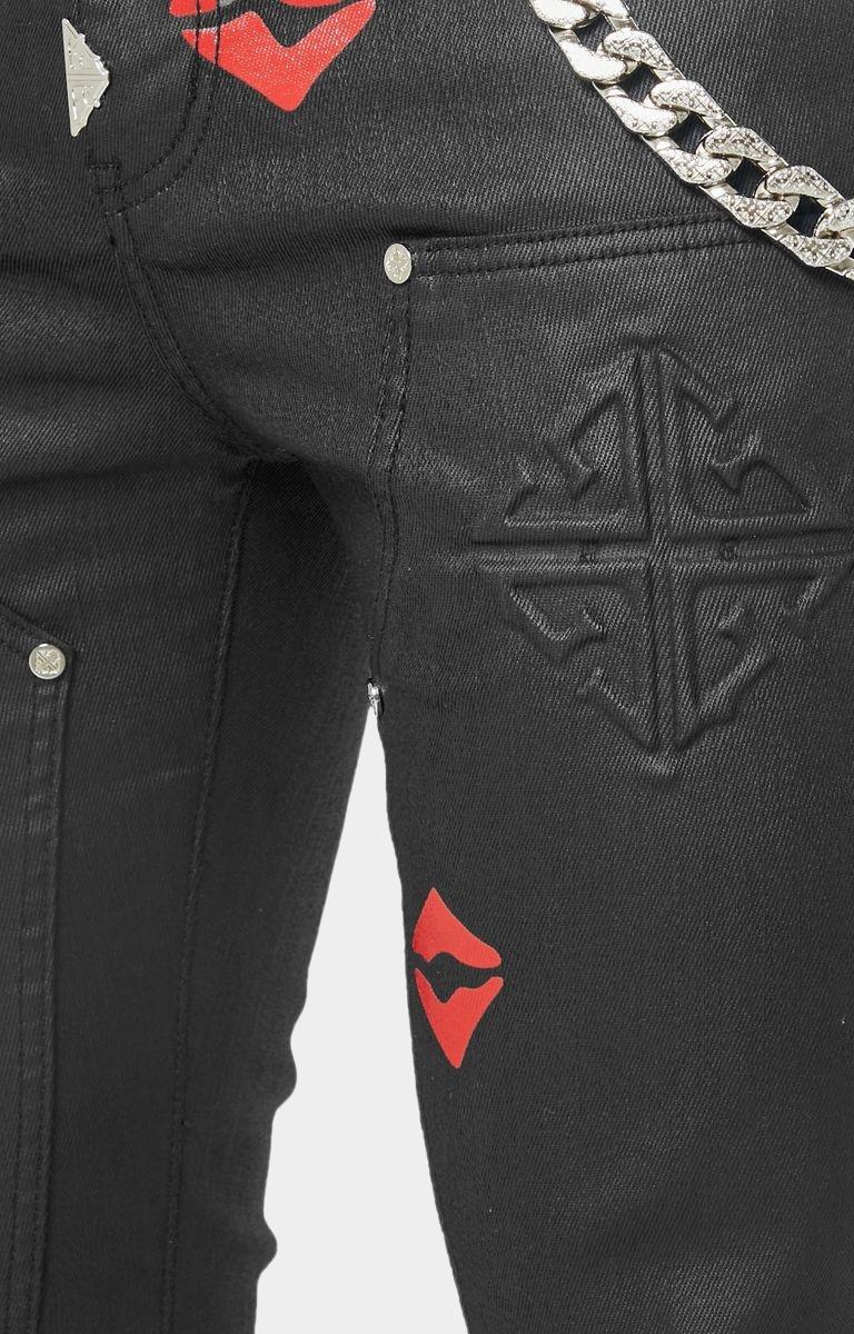 Embossed GUAPI logo on stacked kiss denim jeans.