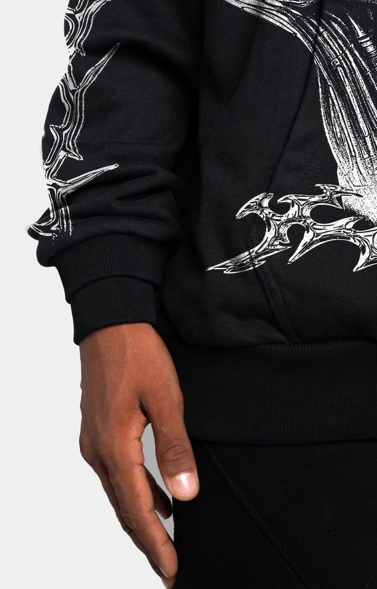 Close-up of cyborg-inspired detailing on GUAPI Black Hoodie.