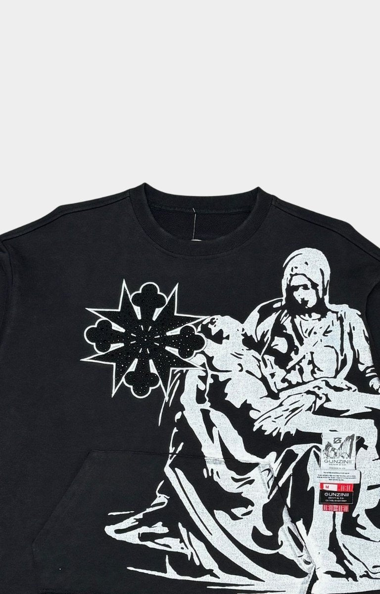 Close-up of rhinestone embellishment on GUNZINII Caring Crew Sweatshirt