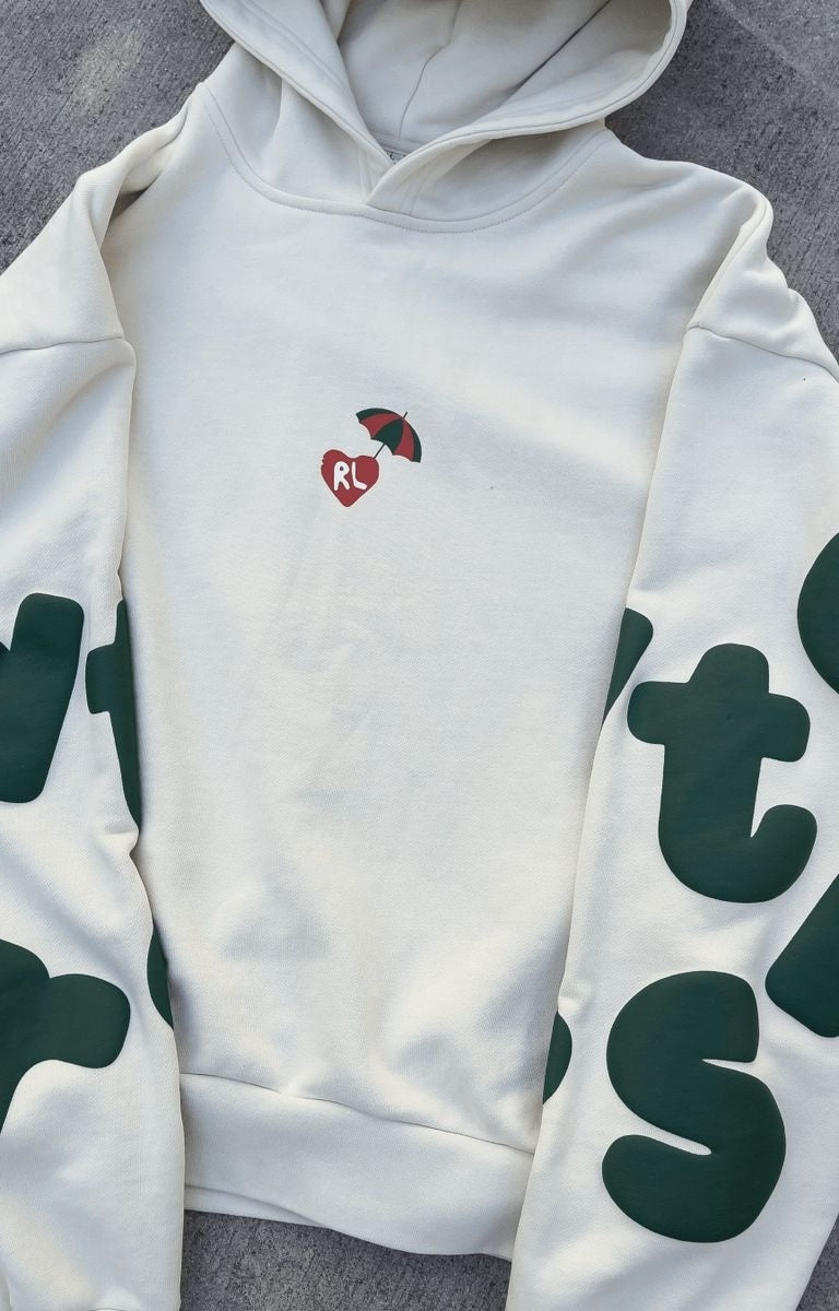 Lifestyle shot of Red Letters Main Beach Scattered Hoodie in streetwear outfit.