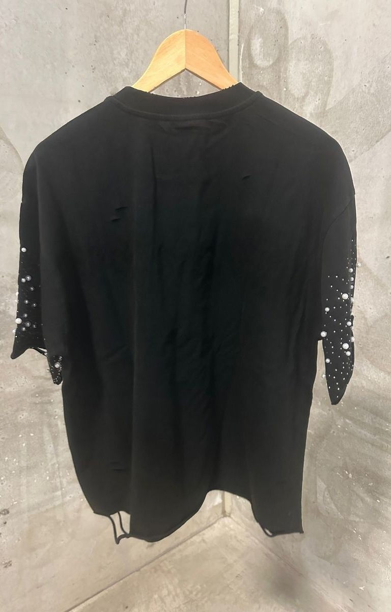 Back view of distressed ivory cropped embellished sleeves streetwear tee.