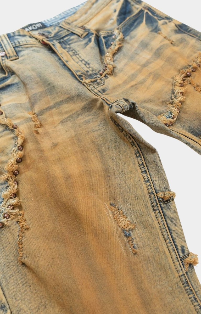 Close-up detail of Makobi Ferdoni Jeans Dirt Wash stitching and wash.