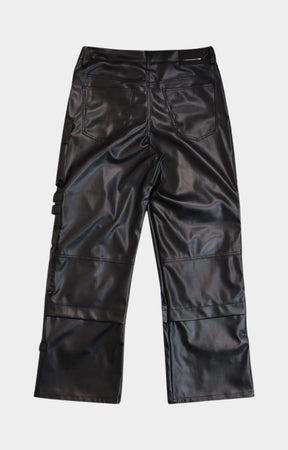 Streetwear styling of First Row wide fit faux leather Y2K cargo pants - back view.