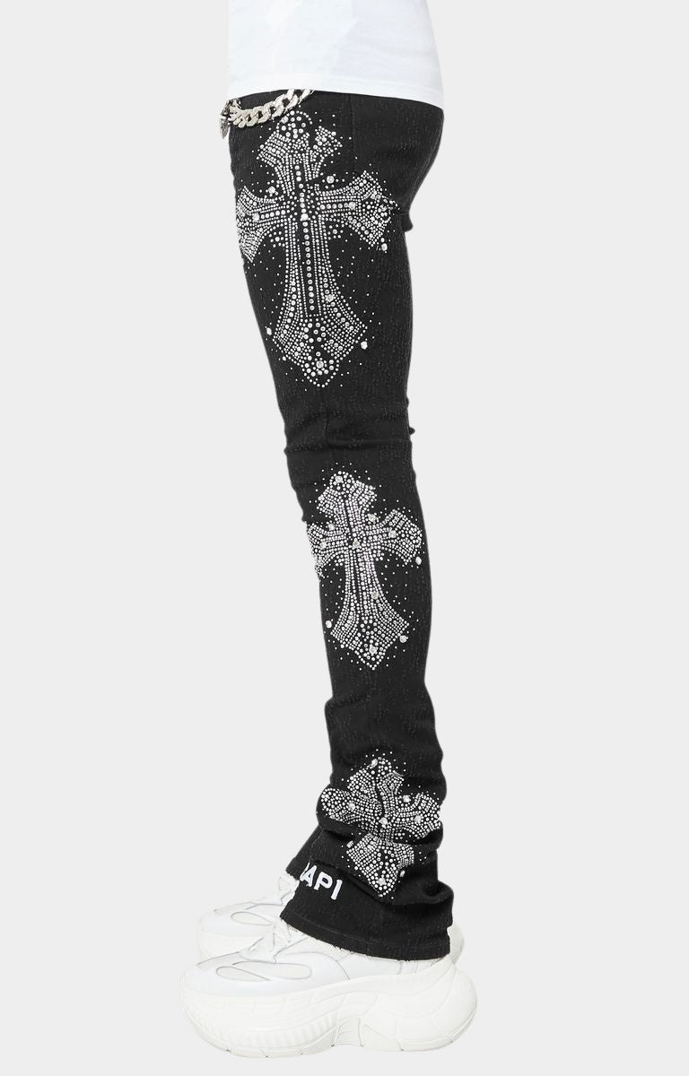 Obsidian Black skinny denim with embroidered GUAPI logo and embellishments.