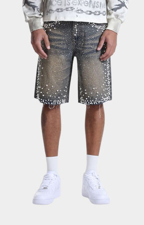 Casual styling of black denim shorts.
