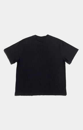 Concept LA Cherub 1 Graphic T-Shirt in Black featuring oversized grayscale cherub and cloud artwork, distressed CONCEPT LA lettering, short sleeves, and a relaxed fit.