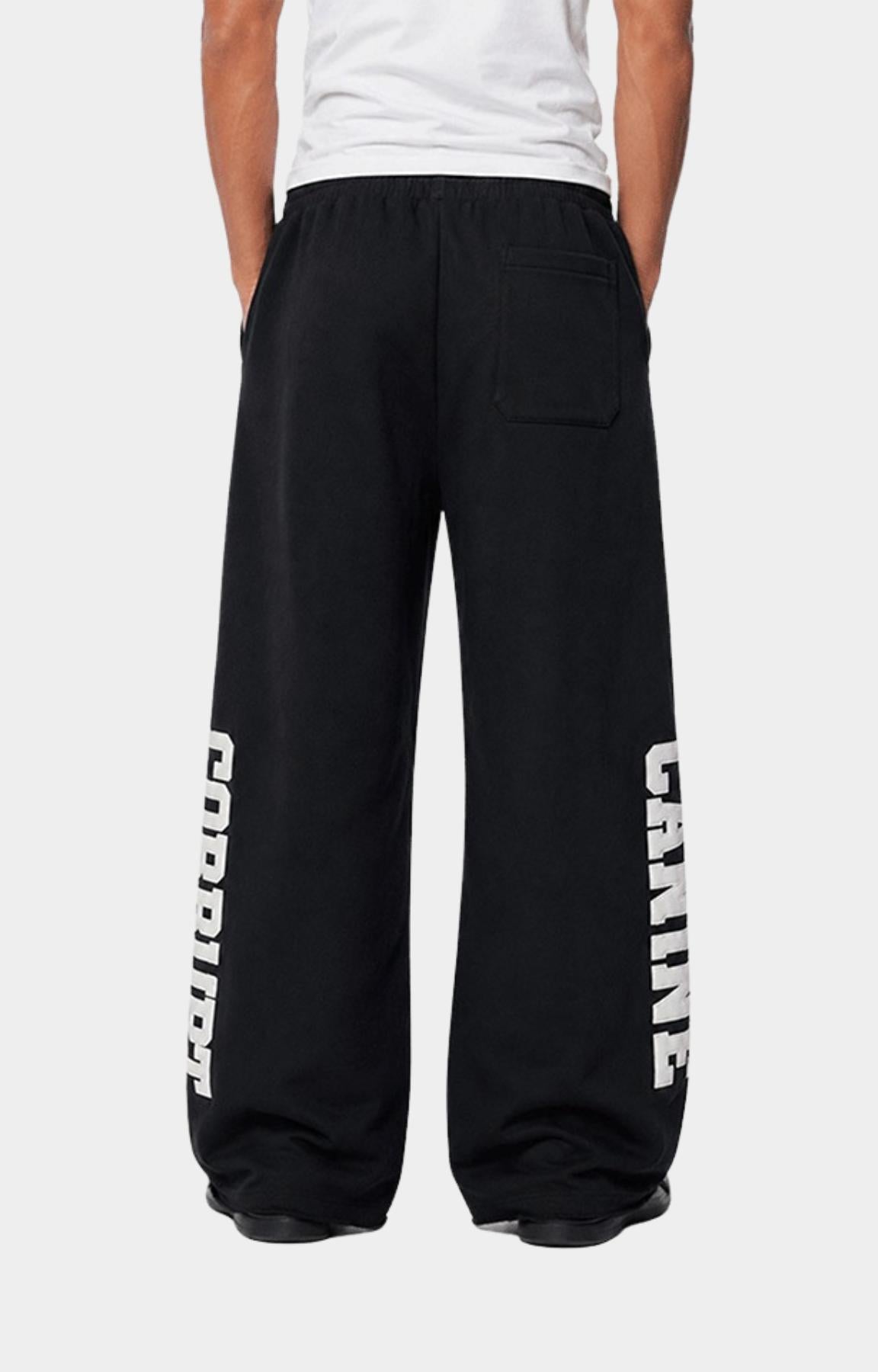 Statement graphic detail on Corrupt K9 wide leg sweatpants.