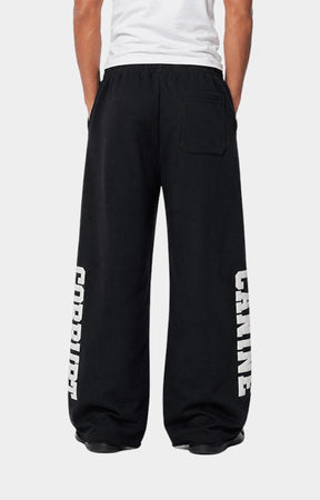 Statement graphic detail on Corrupt K9 wide leg sweatpants.