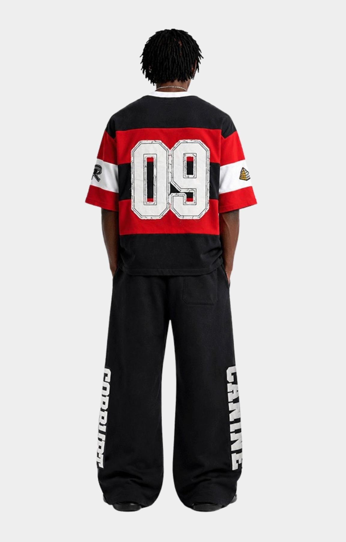Black and red rugby stripe detail on Corrupt K9 T-Shirt.
