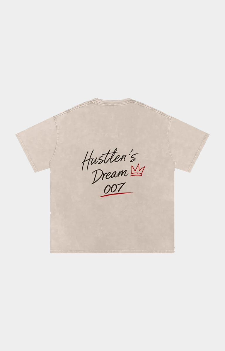 Drip Trap light beige short-sleeve t-shirt with a graphic on the chest reading 'Hustler's Dream 007' in black script and red text.