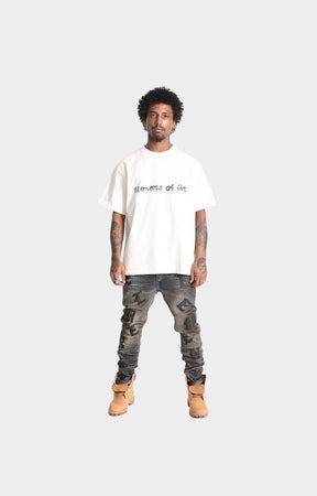 Model wearing Element’s Resort Doodle tee in beige.