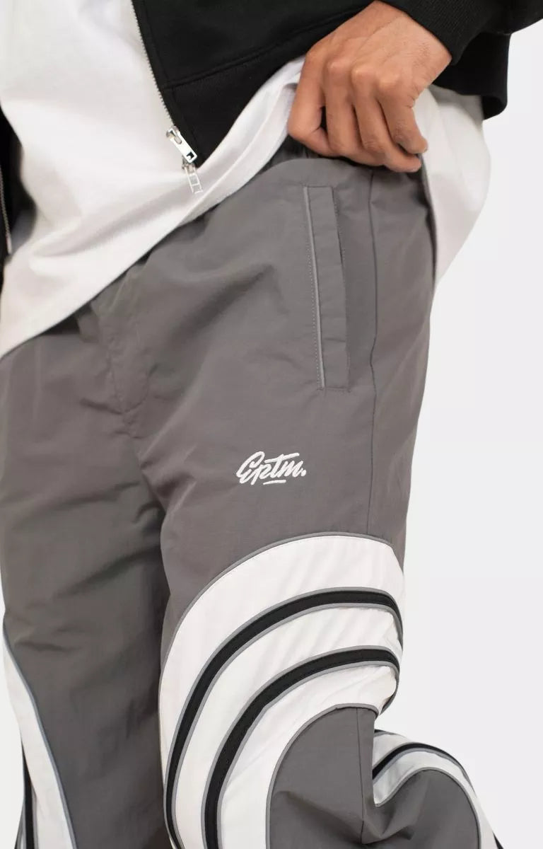 Close-up texture of nylon ripstop fabric on EPTM pants.