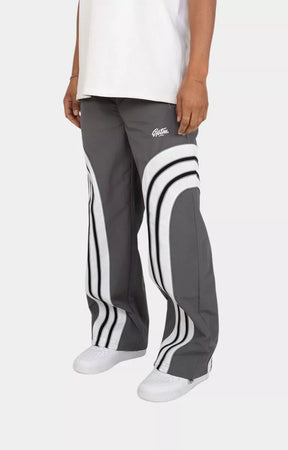 Side profile of grey EPTM reflective piping track pants
