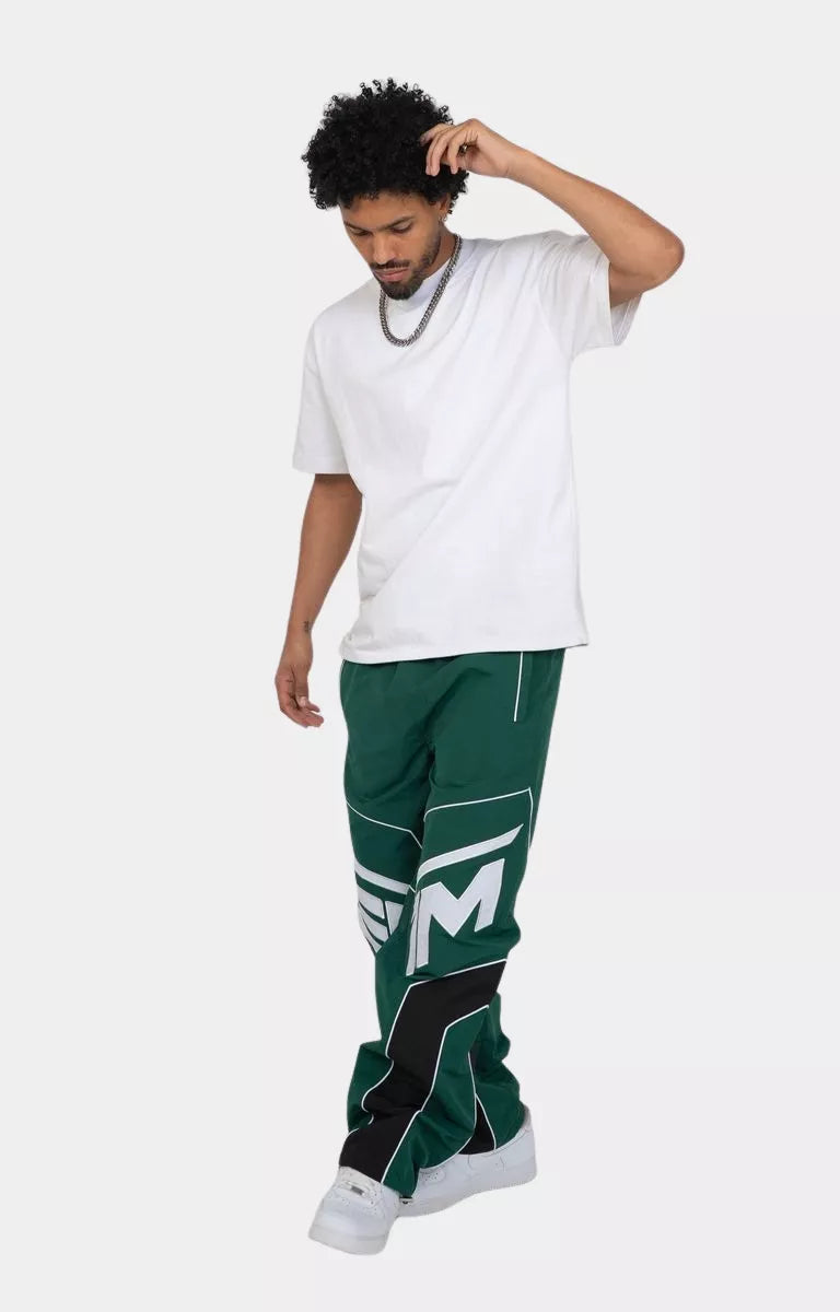 Modern green streetwear pants with contrast panel design