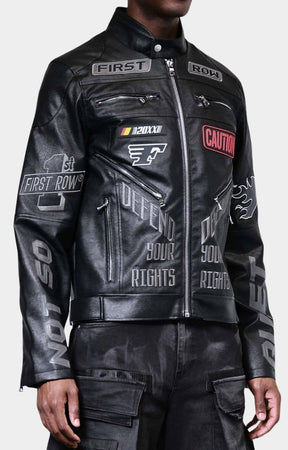 Close-up of patches and zip details on First Row Caution Not So Quiet Racing Jacket.