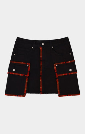 Close-up detail of embroidery and cargo pockets on First Row Plaid Mini Skirt.
