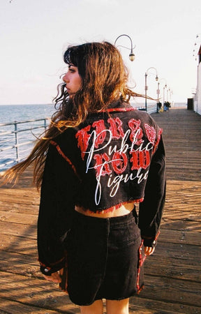 Close-up of embroidery and chest pocket on First Row Plaid Edge Point Crop Jacket.