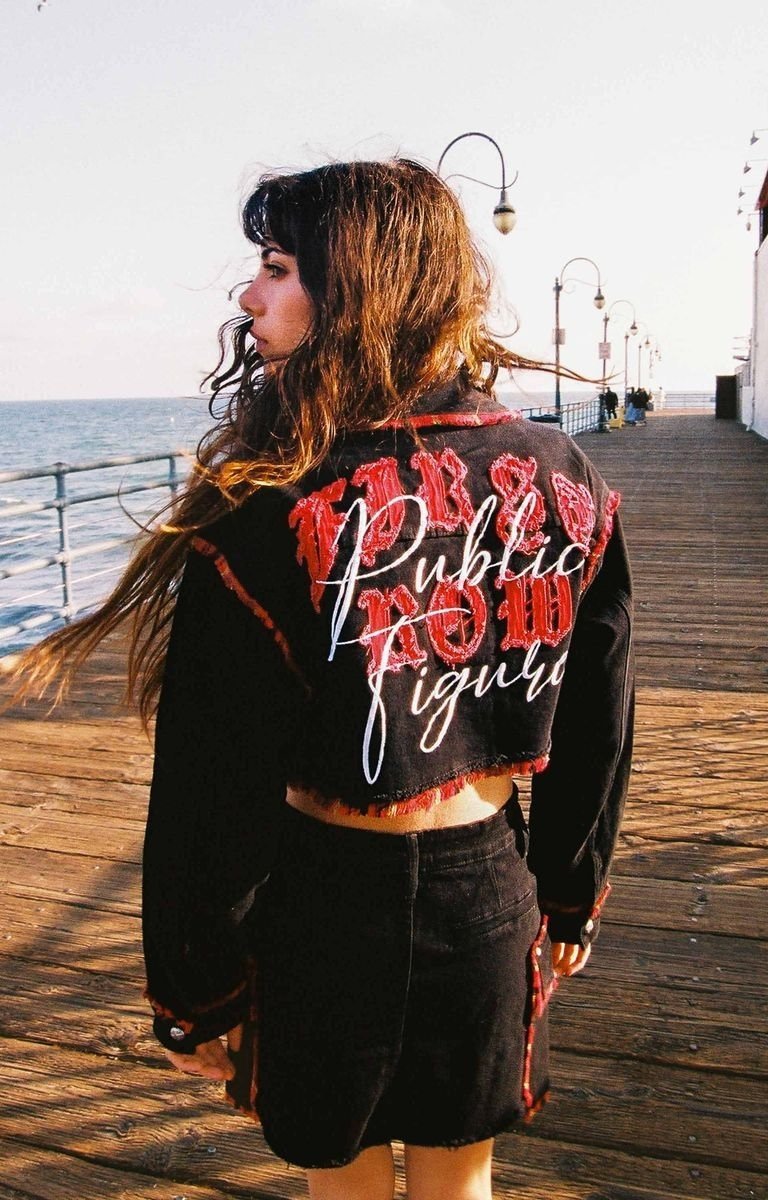 Close-up of embroidery and chest pocket on First Row Plaid Edge Point Crop Jacket.