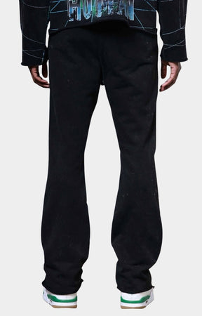 Back view of First Row post human matrix flare/stacked jogger in 100% cotton with washed finish.