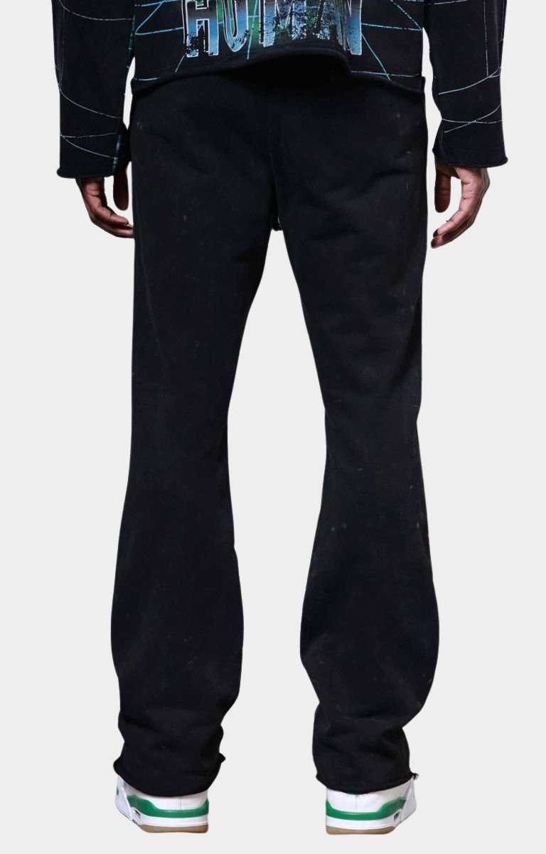 Back view of First Row post human matrix flare/stacked jogger in 100% cotton with washed finish.