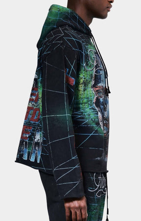 Side view of oversized First Row Post Human Matrix Hoodie in washed black cotton at High Street Brands Co. 