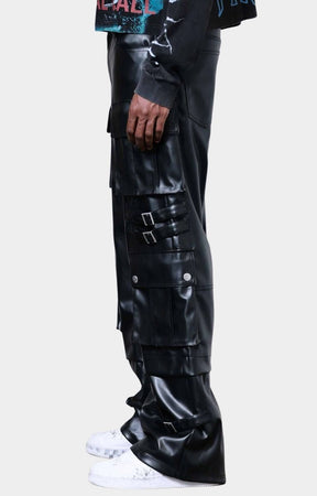 Side view of wide fit First Row PU cargo pants with utility pockets.