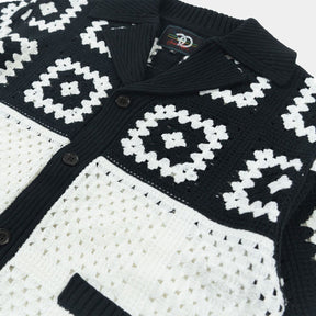 Close-up of Black White crochet knit detailing on Frost shirt.