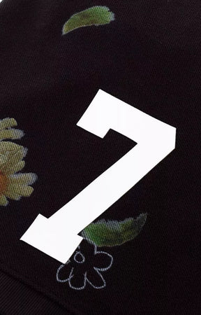 Raised rubber graphic detail on GFA Manasseh All Things Knit Shorts.