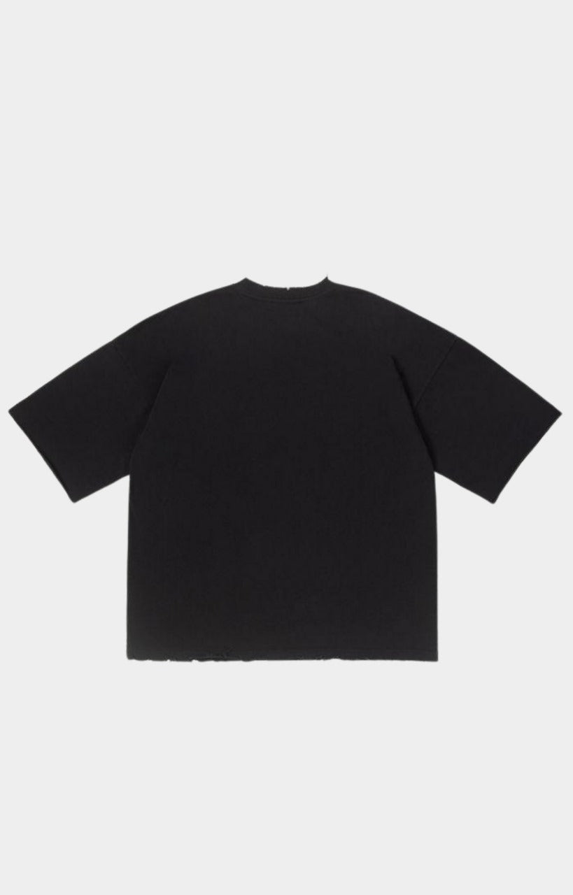 Back view of oversized GFA Manasseh Chomp SS Knit streetwear shirt.