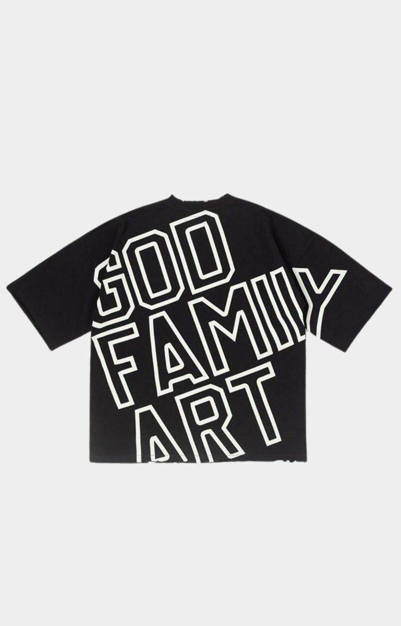 Back view of gold grill smile and pink God Family Art print on black oversized tee.