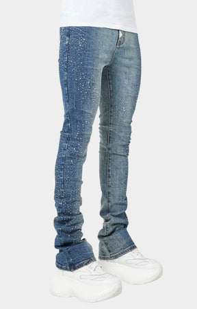 Streetwear outfit featuring GUAPI acid blue stacked skinny jeans and sneakers.