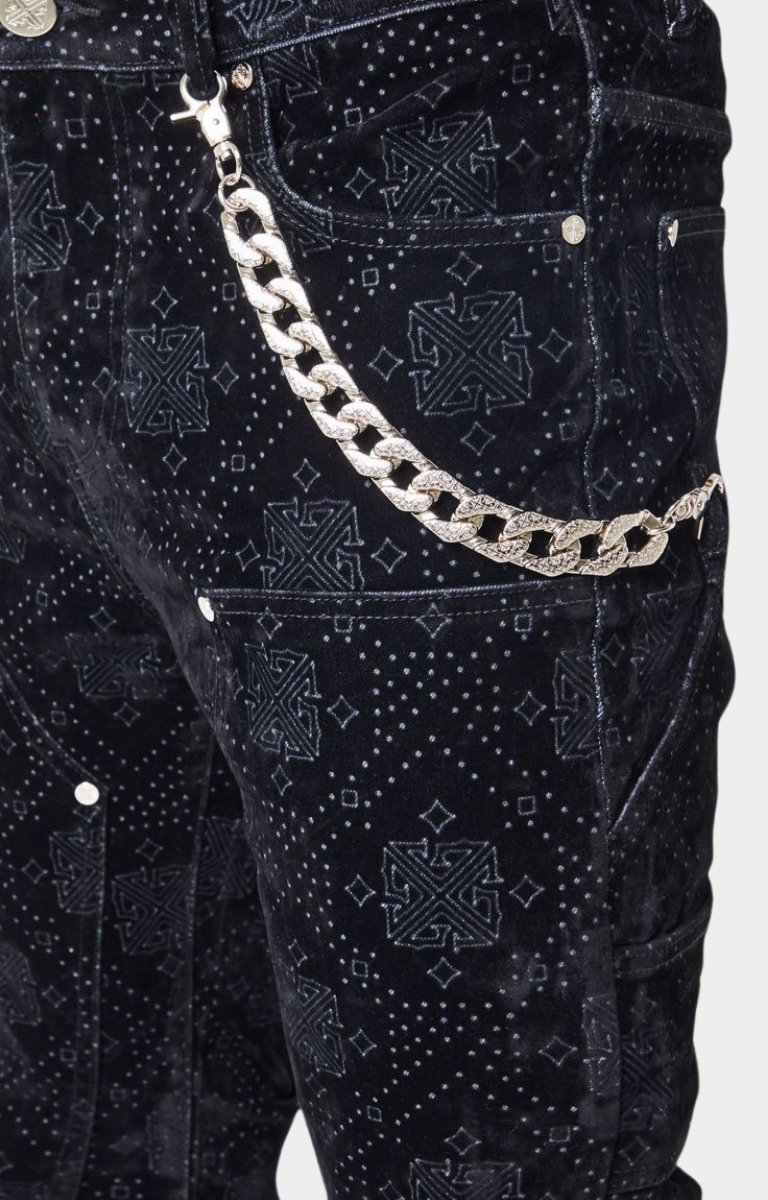 Detachable silver chain detail on Guapi All Black Monogram Denim