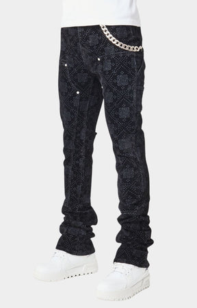 Side angle showing tapered fit of Guapi-All Black Velour Denim.