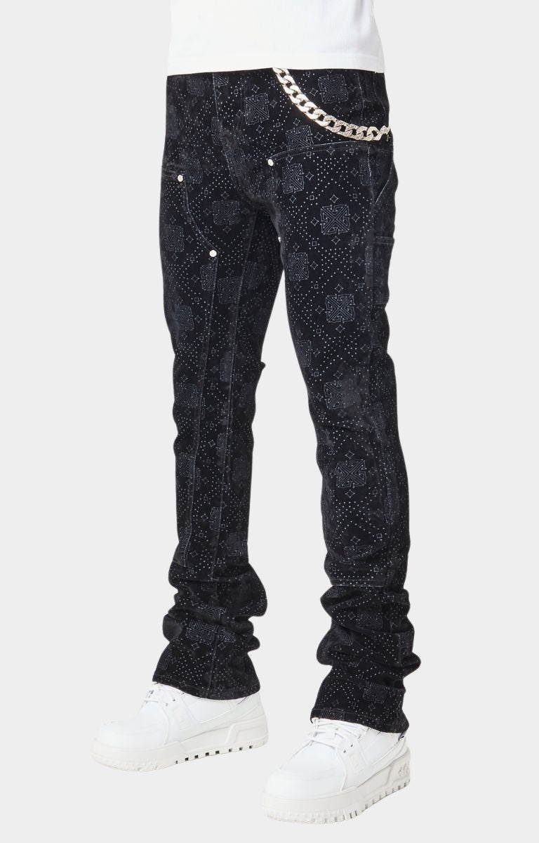 Side angle showing tapered fit of Guapi-All Black Velour Denim.