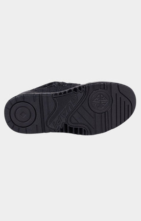 Deep tread outsole detail on black sneaker.