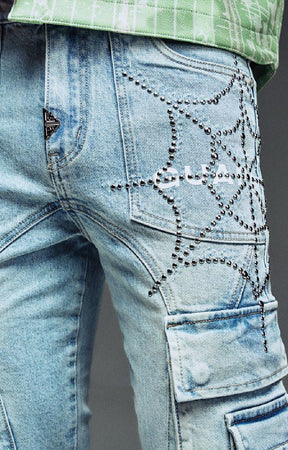 Guapi aqua blue denim featuring rhinestone embellishment.
