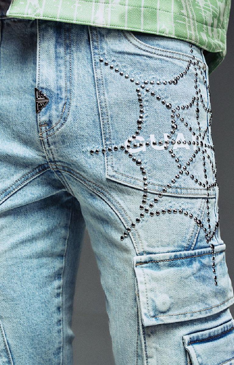 Guapi aqua blue denim featuring rhinestone embellishment.