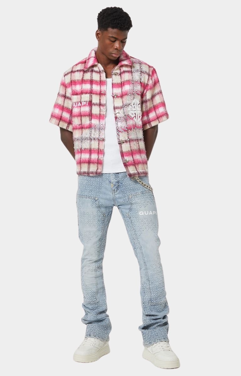 GUAPI metal hardware and emblem chain accessory.