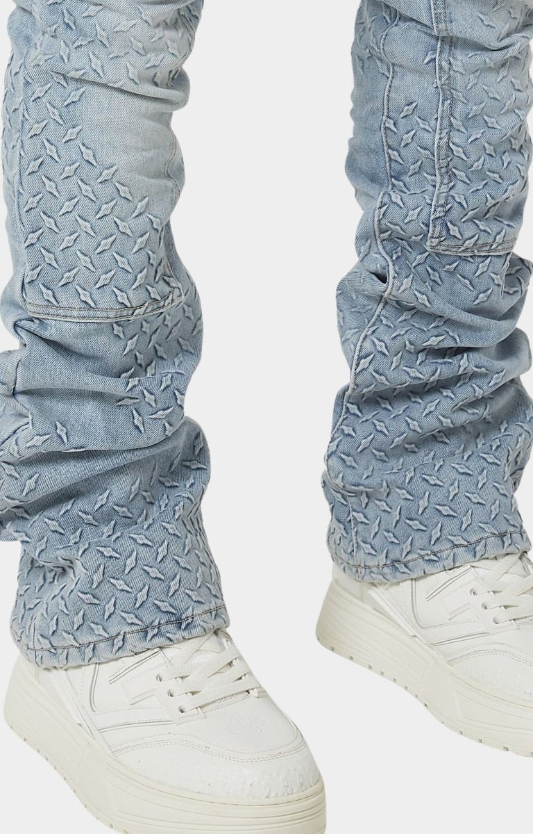 Stacked leg silhouette of Guapi Aqua Blue denim
