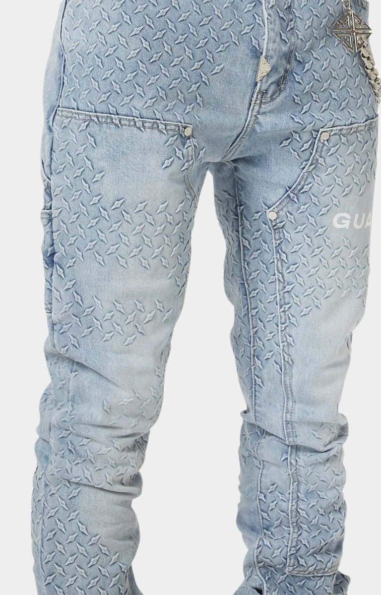 Industrial tread pattern detailing on Guapi denim.