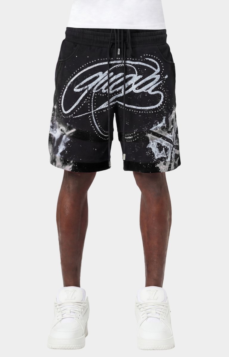 Guapi Ascension rhinestone graphic shorts featuring oversized streetwear artwork.