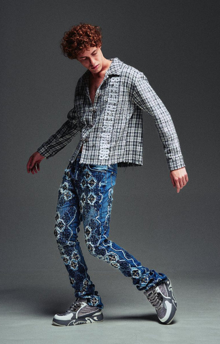 Guapi Ash Plaid Shirt featuring a grey and black plaid pattern, loop-and-toggle closures, open collar, graphic detailing, long sleeves, and relaxed fit.