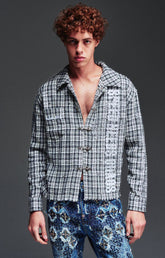 Guapi Ash Plaid Shirt featuring a grey and black plaid pattern, loop-and-toggle closures, open collar, graphic detailing, long sleeves, and relaxed fit.
