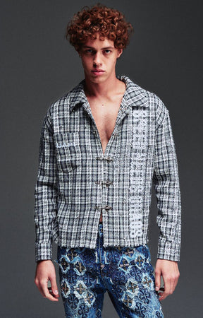 Guapi Ash Plaid Shirt featuring a grey and black plaid pattern, loop-and-toggle closures, open collar, graphic detailing, long sleeves, and relaxed fit.