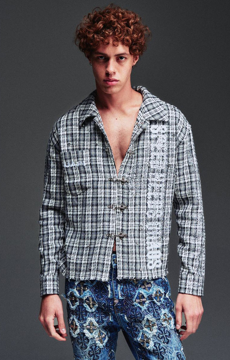 Guapi Ash Plaid Shirt featuring a grey and black plaid pattern, loop-and-toggle closures, open collar, graphic detailing, long sleeves, and relaxed fit.