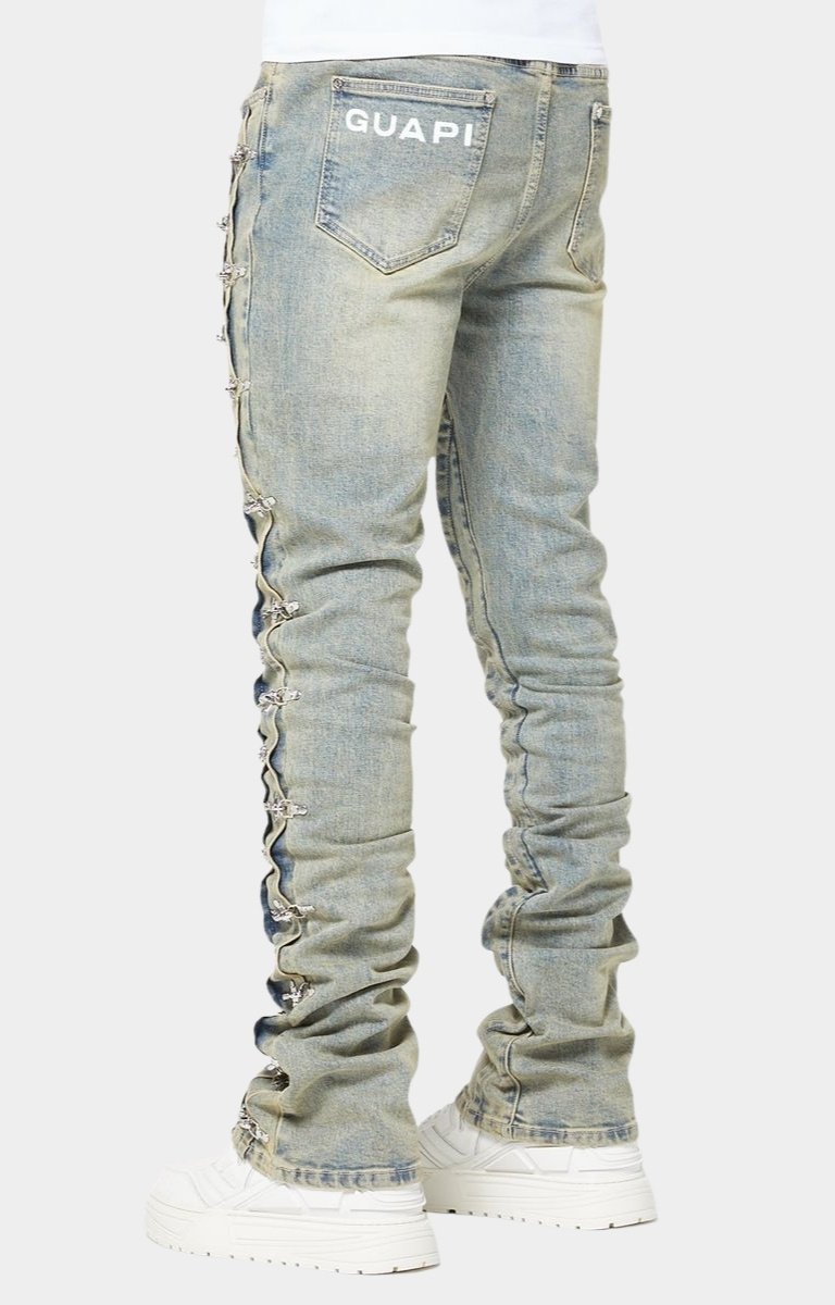 GUAPI branded back pocket detail on denim.