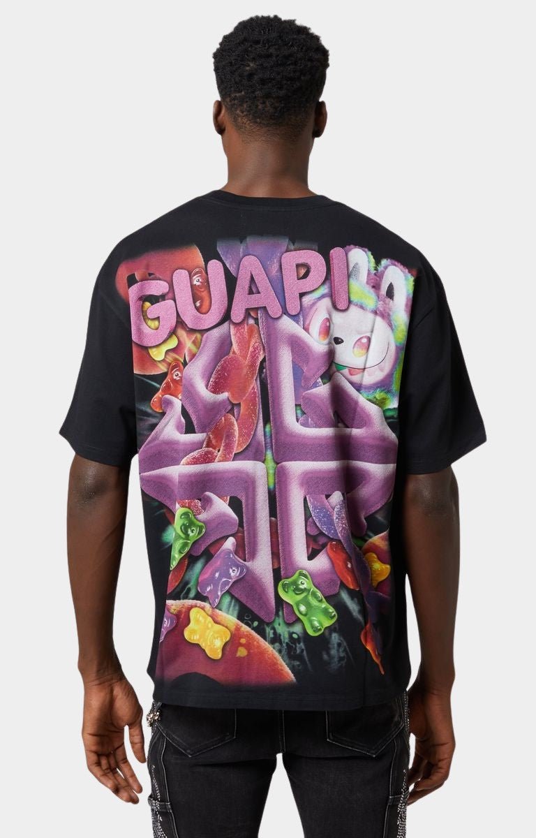 Back view of Guapi Black Candy Riot Tee V1 with oversized 3D GUAPI monogram