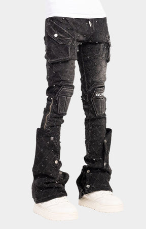 Oversized flap cargo pocket with metal buttons on guapi black coffin arc embellished denim. 
