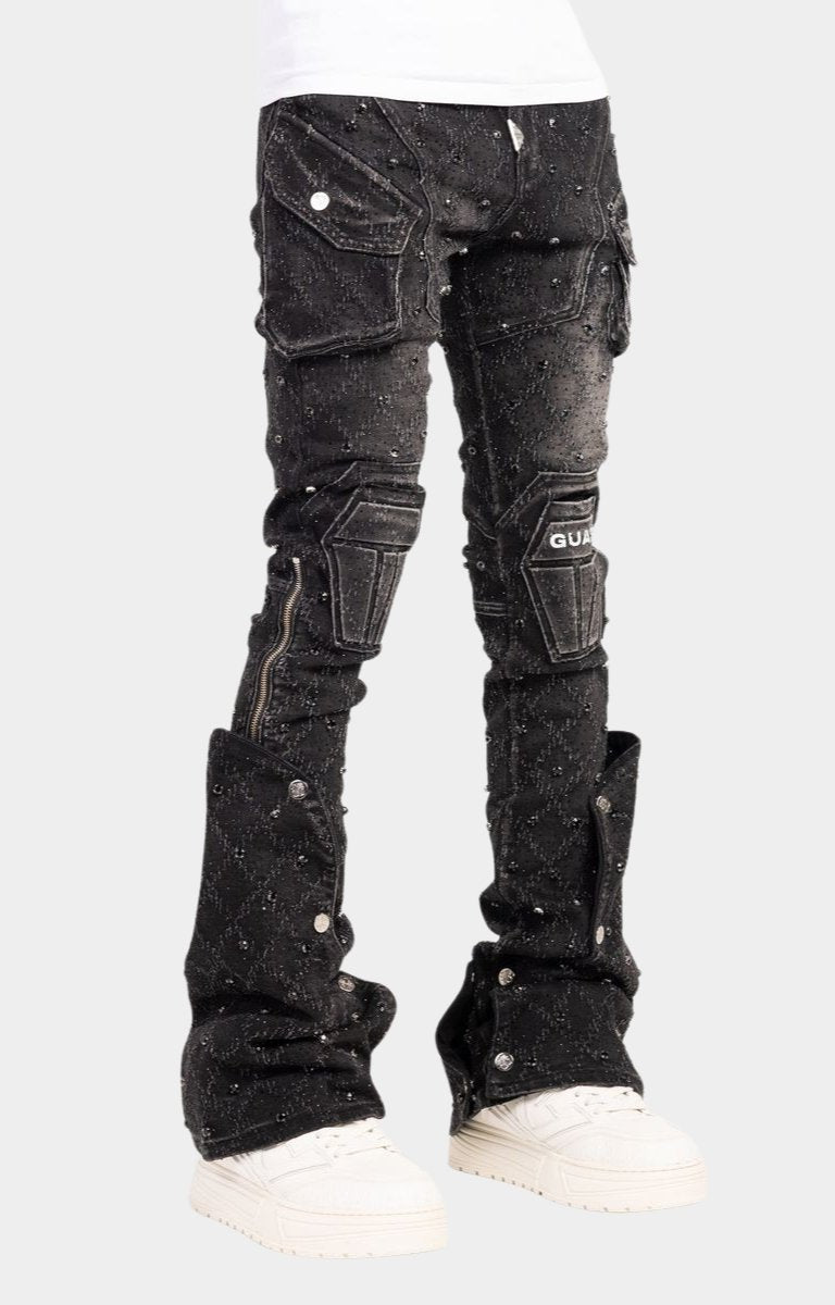 Oversized flap cargo pocket with metal buttons on guapi black coffin arc embellished denim. 