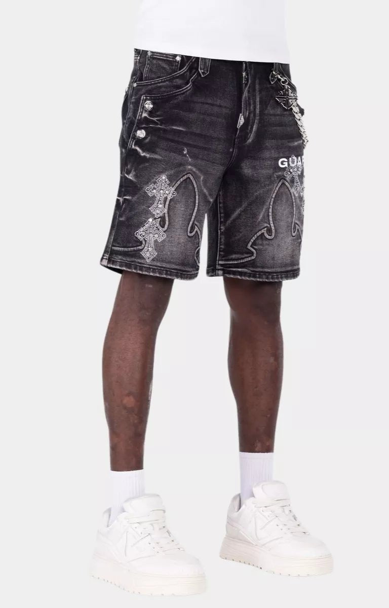Guapi black streetwear denim shorts with cross detailing and luxury craftsmanship.